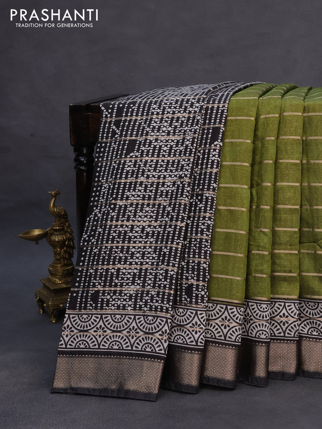 Assam partly silk saree mehendi green and black with digital prints & zari weaves and zari woven border