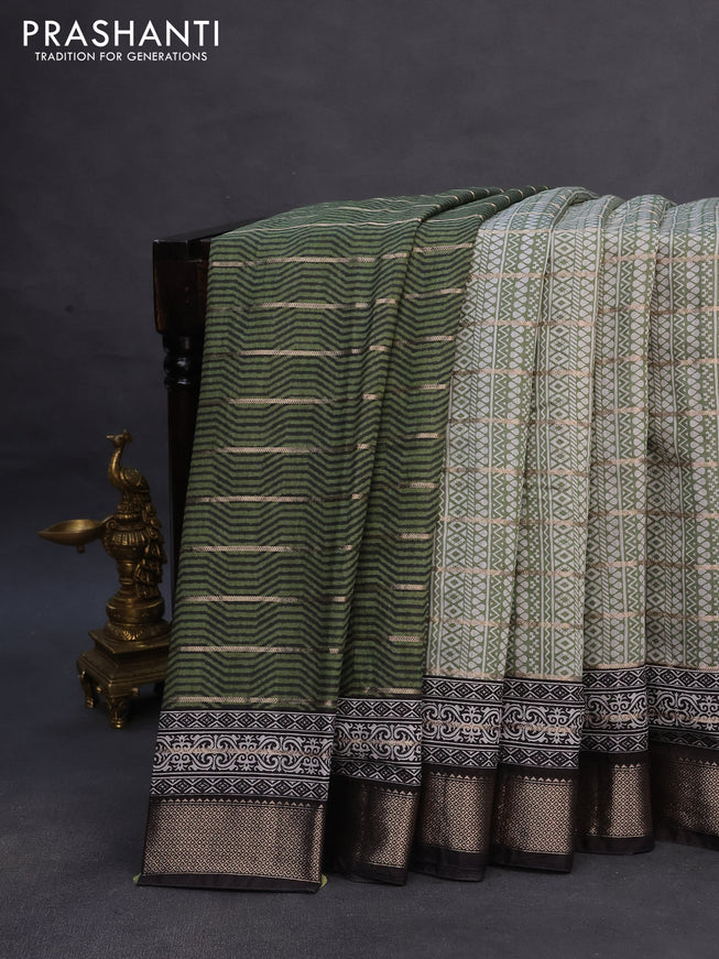 Assam partly silk saree pastel green and black with digital prints & zari weaves and zari woven border