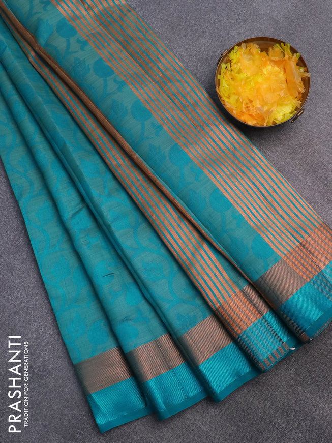 Semi raw silk saree cs blue with allover self emboss and zari woven border