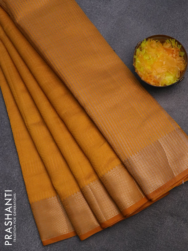 Semi raw silk saree mustard yellow with allover self emboss and zari woven border