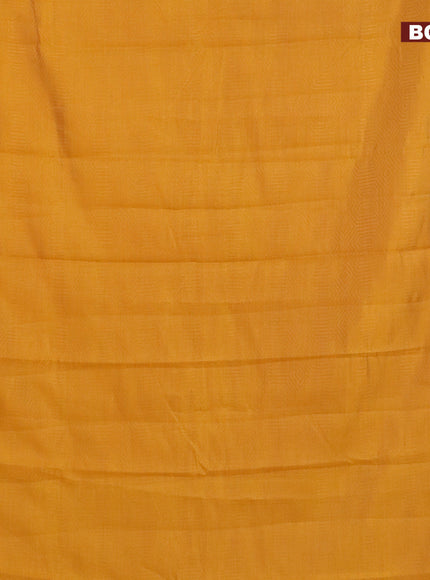 Semi raw silk saree mustard yellow with allover self emboss and zari woven border