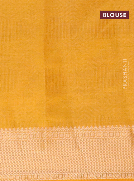 Semi raw silk saree mustard yellow with allover self emboss and zari woven border