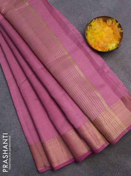 Semi raw silk saree mauve pink with allover self emboss and zari woven border