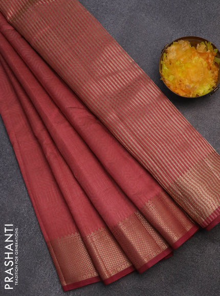 Semi raw silk saree pastel maroon with allover self emboss and zari woven border