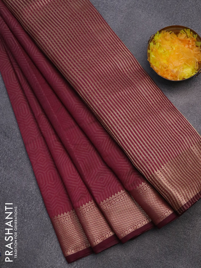 Semi raw silk saree wine shade with allover self emboss and zari woven border