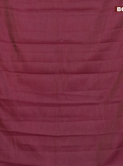 Semi raw silk saree wine shade with allover self emboss and zari woven border