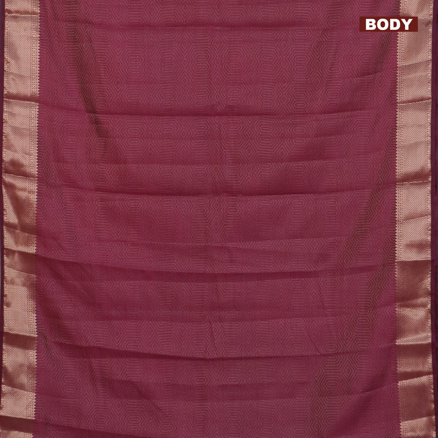 Semi raw silk saree wine shade with allover self emboss and zari woven border