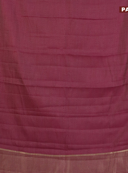 Semi raw silk saree wine shade with allover self emboss and zari woven border