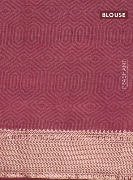 Semi raw silk saree wine shade with allover self emboss and zari woven border