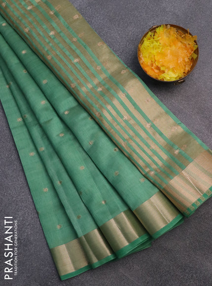 Semi raw silk saree pastel green with zari woven buttas and zari woven border