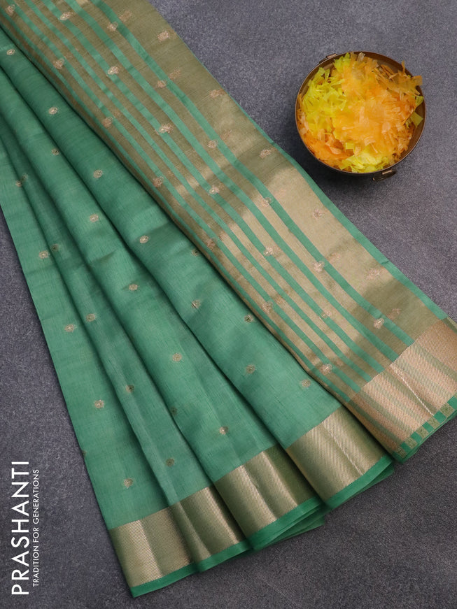 Semi raw silk saree pastel green with zari woven buttas and zari woven border