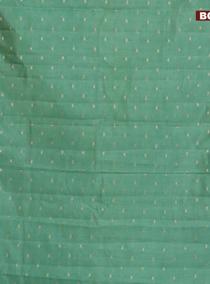 Semi raw silk saree pastel green with zari woven buttas and zari woven border