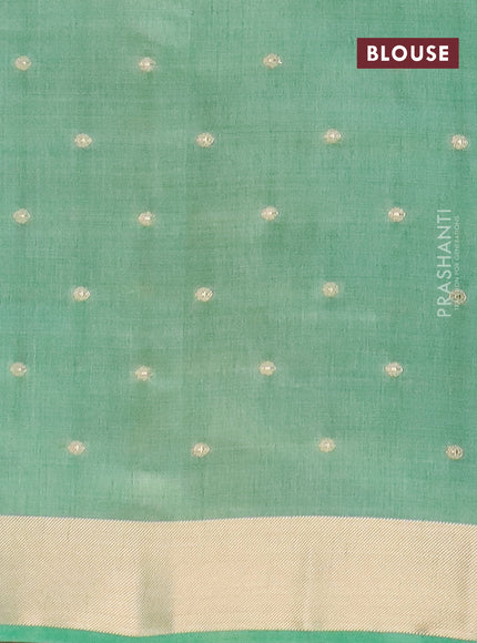 Semi raw silk saree pastel green with zari woven buttas and zari woven border