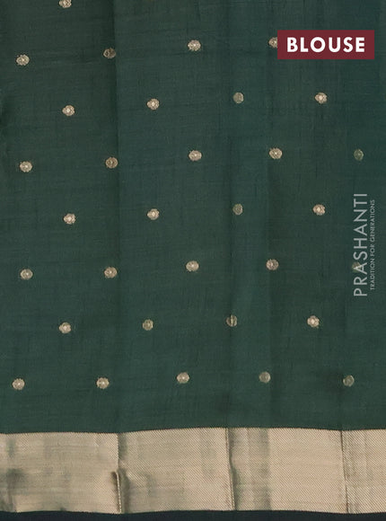 Semi raw silk saree green with zari woven buttas and zari woven border