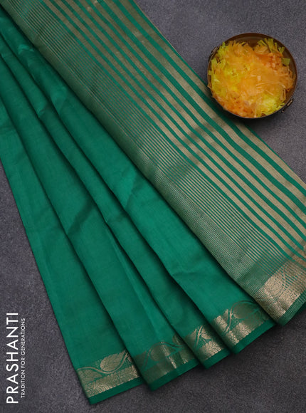 Semi raw silk saree green with plain body and leaf design zari woven border