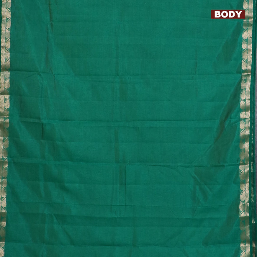 Semi raw silk saree green with plain body and leaf design zari woven border