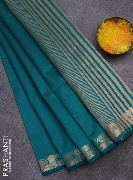 Semi raw silk saree teal blue with plain body and leaf design zari woven border