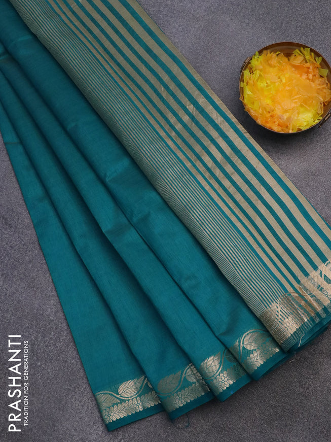 Semi raw silk saree teal blue with plain body and leaf design zari woven border