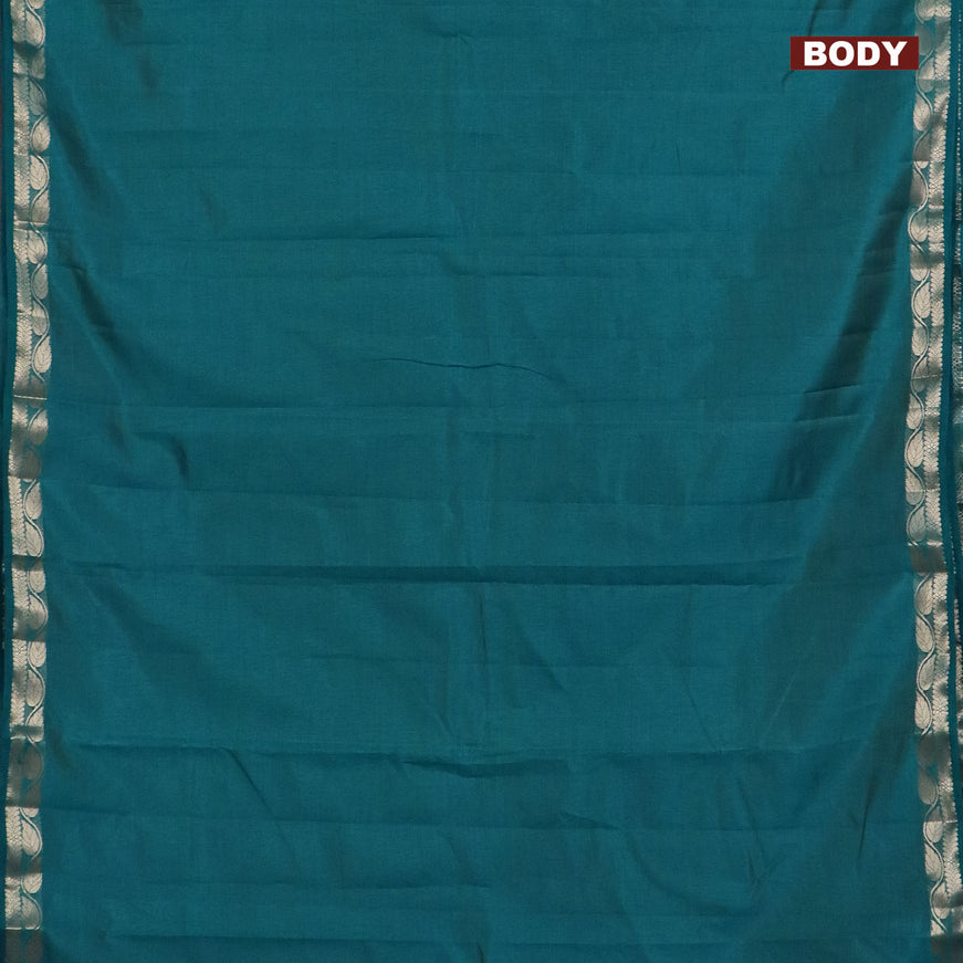 Semi raw silk saree teal blue with plain body and leaf design zari woven border