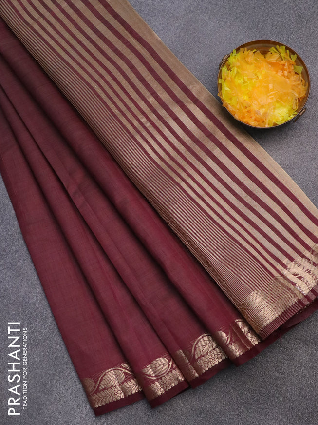 Semi raw silk saree wine shade with plain body and leaf design zari woven border