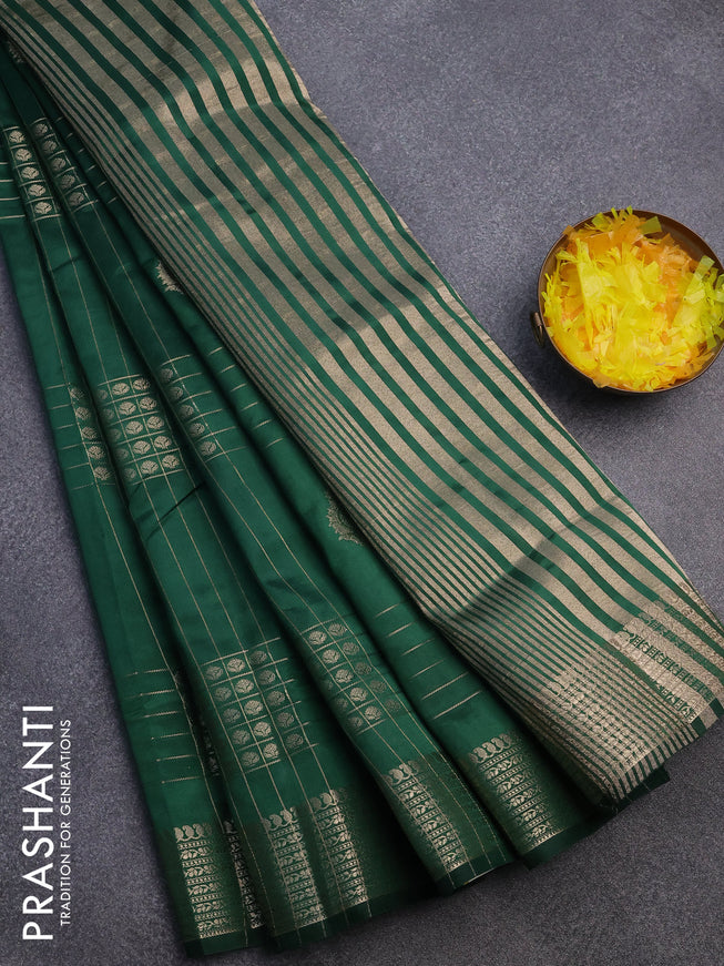 Semi raw silk saree green with allover zari weaves & buttas and zari woven border