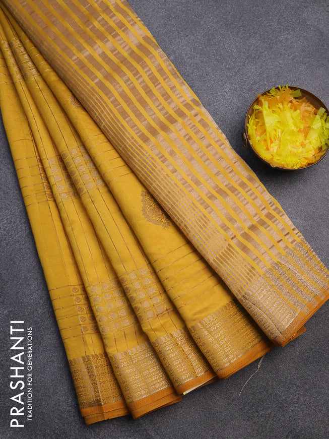 Semi raw silk saree mustard yellow with allover zari weaves & buttas and zari woven border