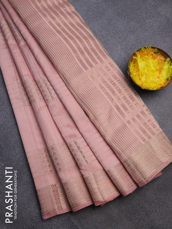 Semi raw silk saree mild peach shade with allover zari weaves & buttas and zari woven border