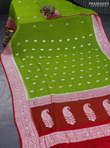 Banarasi chiffon saree mehendi green and red with silver zari woven buttas and silver zari woven border