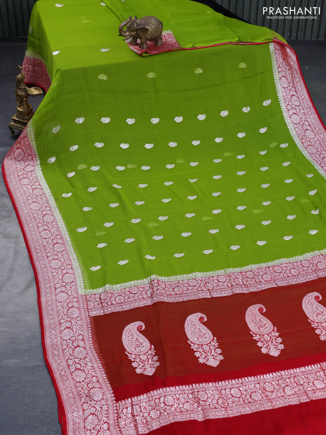 Banarasi chiffon saree mehendi green and red with silver zari woven buttas and silver zari woven border