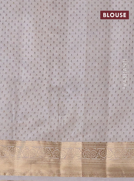 Semi raw silk saree pastel grey with butta prints and zari woven border