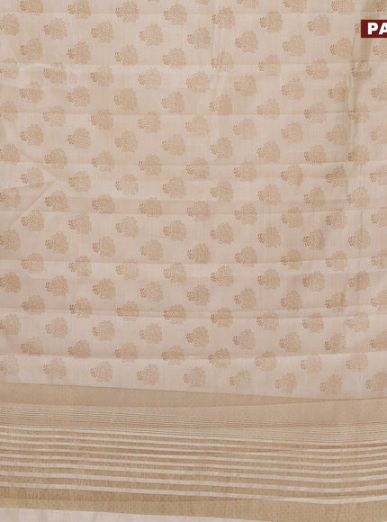 Semi raw silk saree cream with butta prints and zari woven border