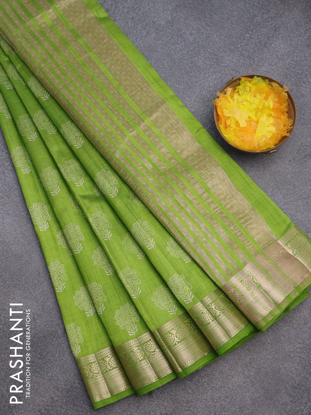 Semi raw silk saree light green with butta prints and zari woven border