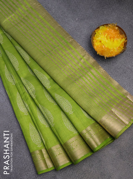 Semi raw silk saree light green with butta prints and zari woven border