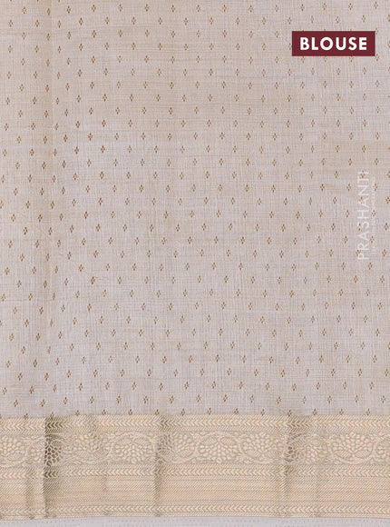 Semi raw silk saree cream with butta prints and zari woven border