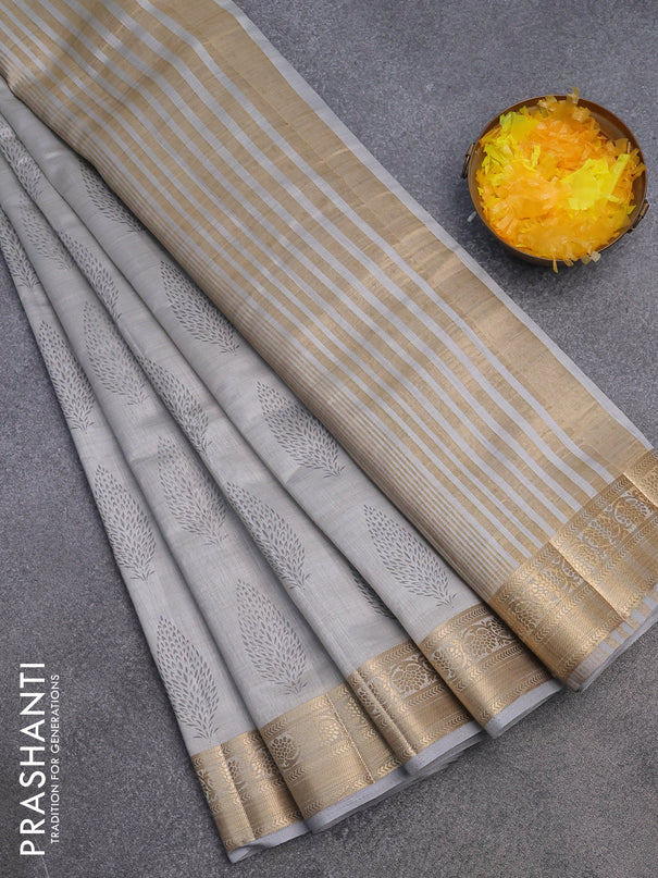 Semi raw silk saree pastel grey with butta prints and zari woven border