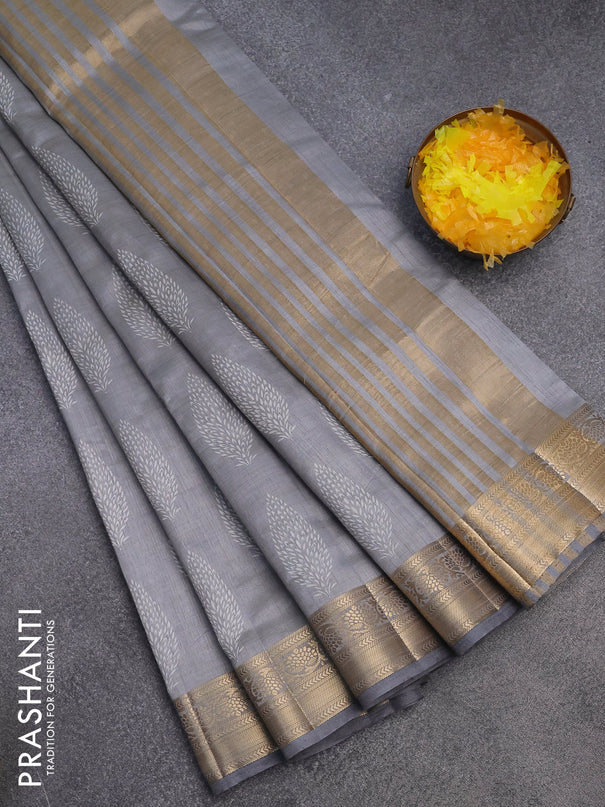 Semi raw silk saree grey with butta prints and zari woven border