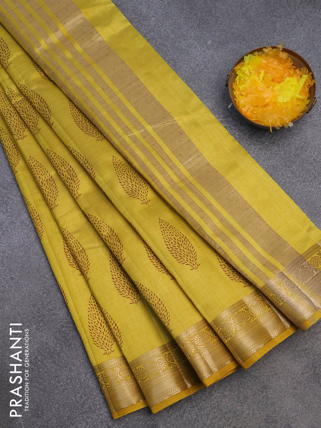 Semi raw silk saree yellow with butta prints and zari woven border