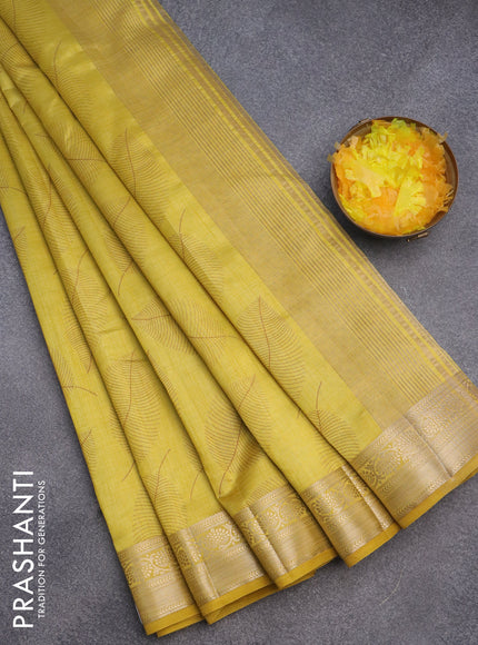 Semi raw silk saree yellow with allover leaf prints and zari woven border