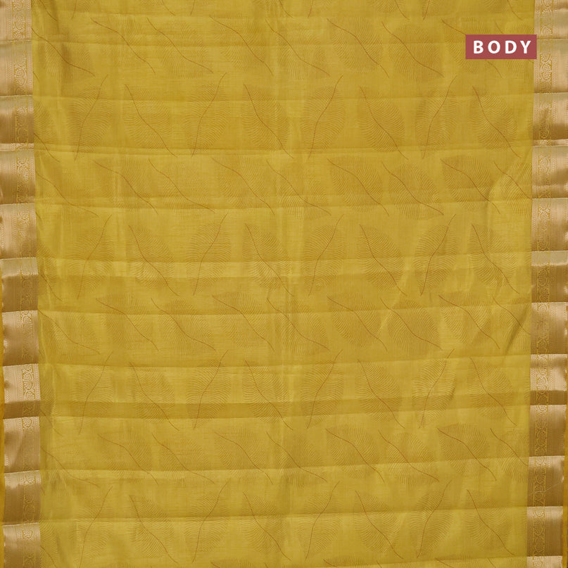 Semi raw silk saree yellow with allover leaf prints and zari woven border