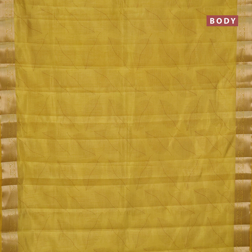 Semi raw silk saree yellow with allover leaf prints and zari woven border