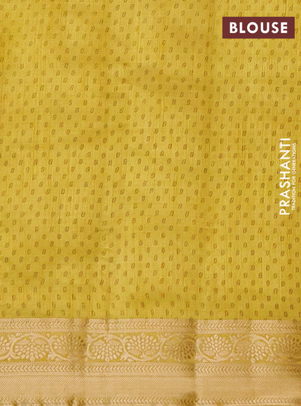 Semi raw silk saree yellow with allover leaf prints and zari woven border