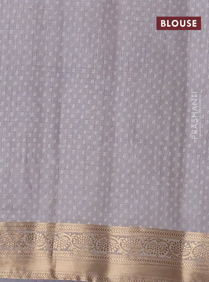 Semi raw silk saree grey with allover leaf prints and zari woven border