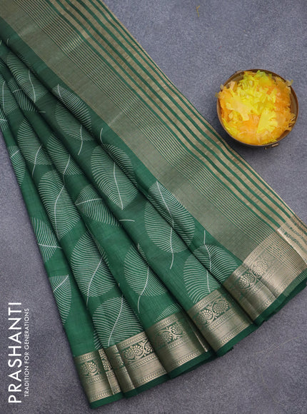 Semi raw silk saree green with allover leaf prints and zari woven border