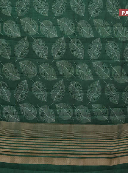 Semi raw silk saree green with allover leaf prints and zari woven border