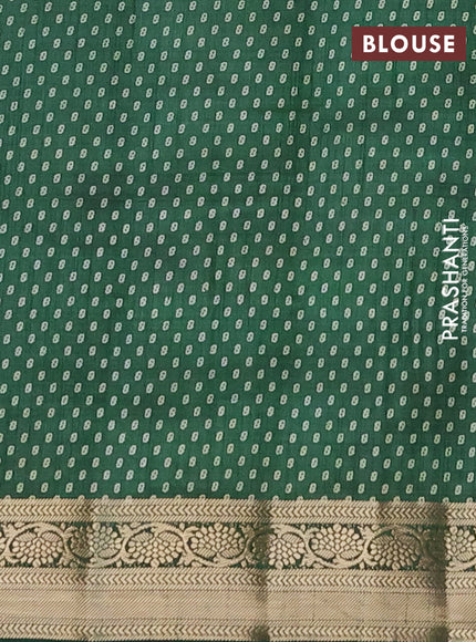 Semi raw silk saree green with allover leaf prints and zari woven border