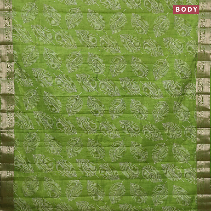 Semi raw silk saree light green with allover leaf prints and zari woven border