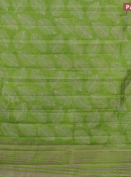 Semi raw silk saree light green with allover leaf prints and zari woven border