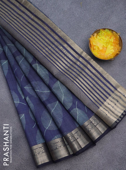 Semi raw silk saree navy blue with allover leaf prints and zari woven border