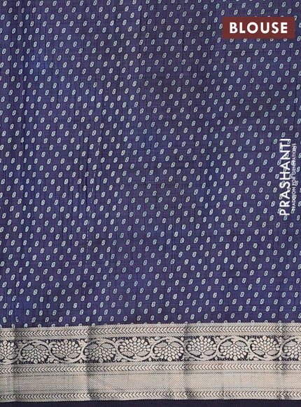 Semi raw silk saree navy blue with allover leaf prints and zari woven border