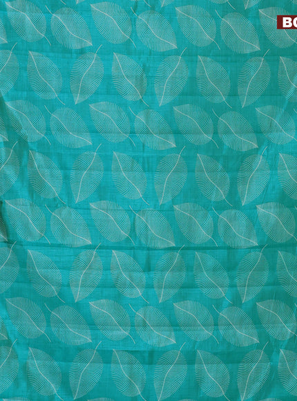 Semi raw silk saree teal blue with allover leaf prints and zari woven border